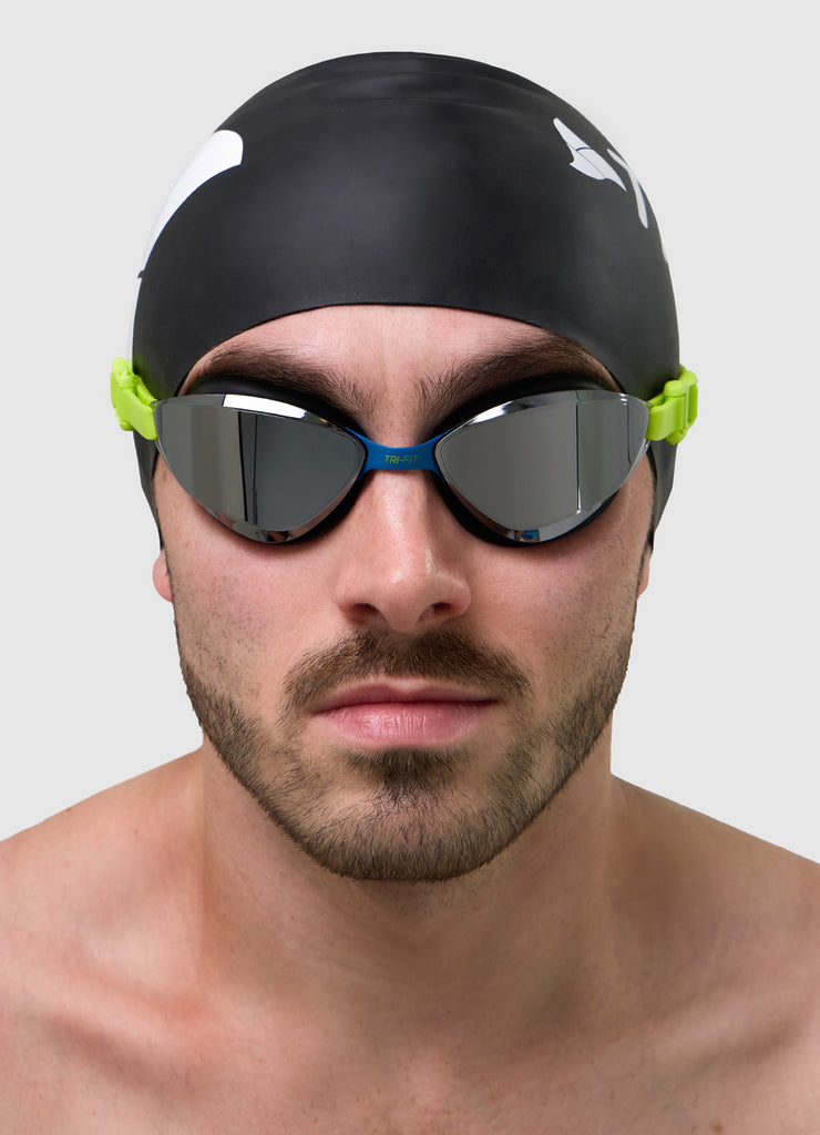 Male swimmer wearing TRI-FIT VOLT swim goggles 