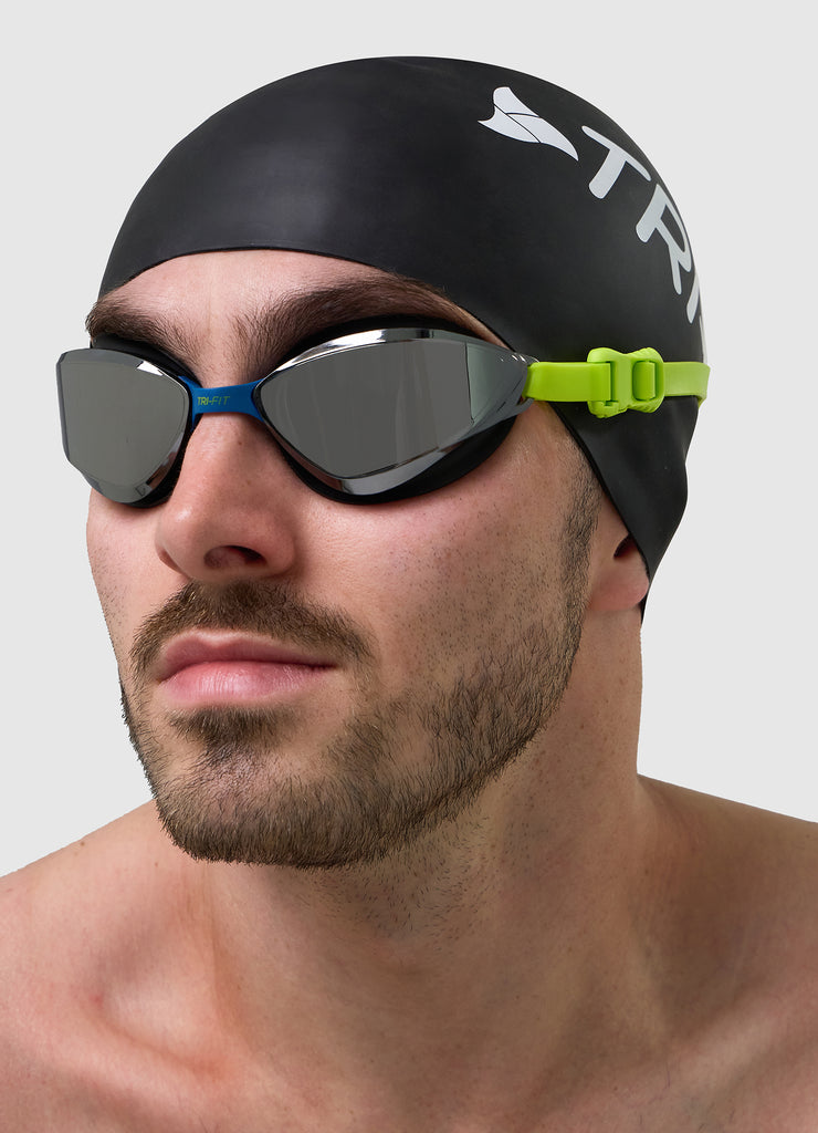 Male swimmer wearing TRI-FIT VOLT swim goggles 