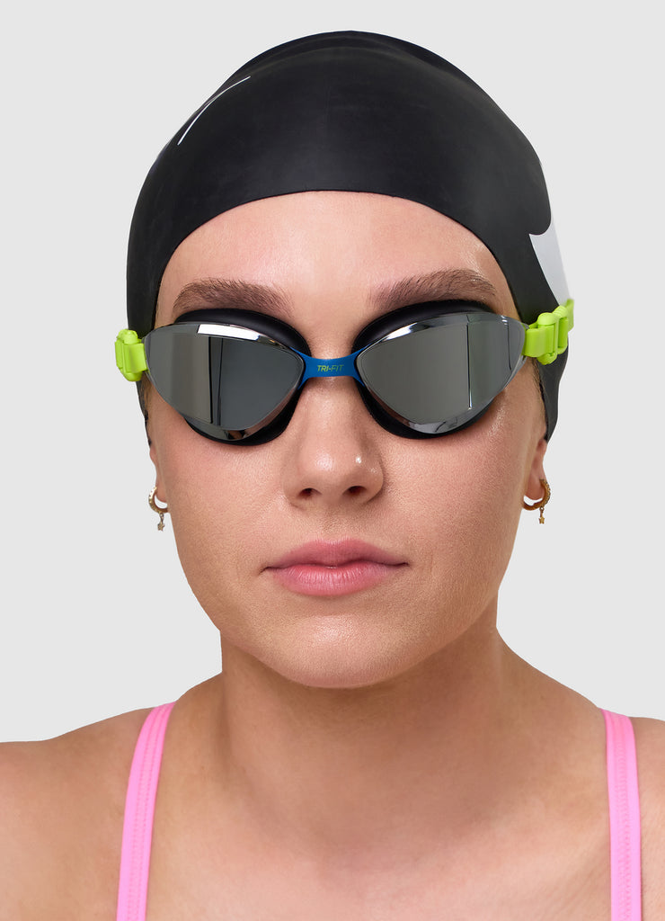 Female swimmer wearing TRI-FIT VOLT swim goggles 