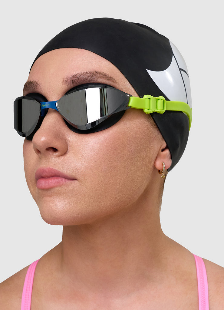 Female swimmer wearing TRI-FIT VOLT swim goggles 