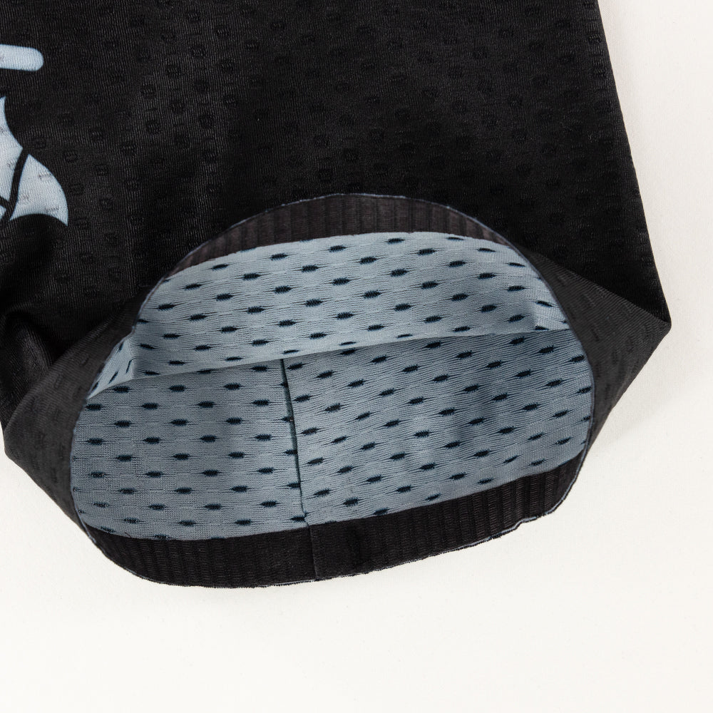 Close-up of the inside hem of the black CORE Calf Sleeves showing fabric texture and welded seam.