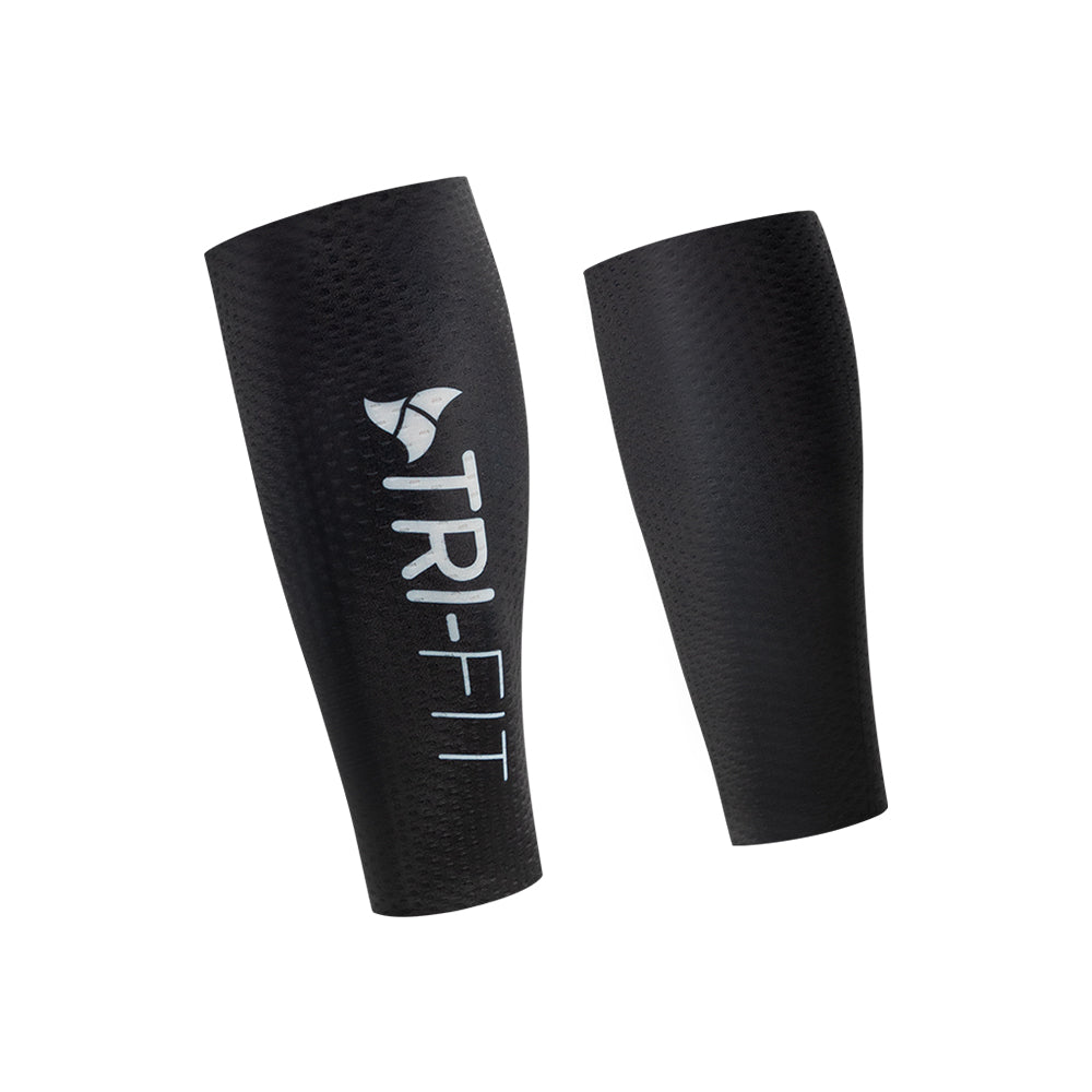 Angled pair of black TRI-FIT CORE Calf Sleeves showing white TRI-FIT logo and textured aero-influenced fabric.