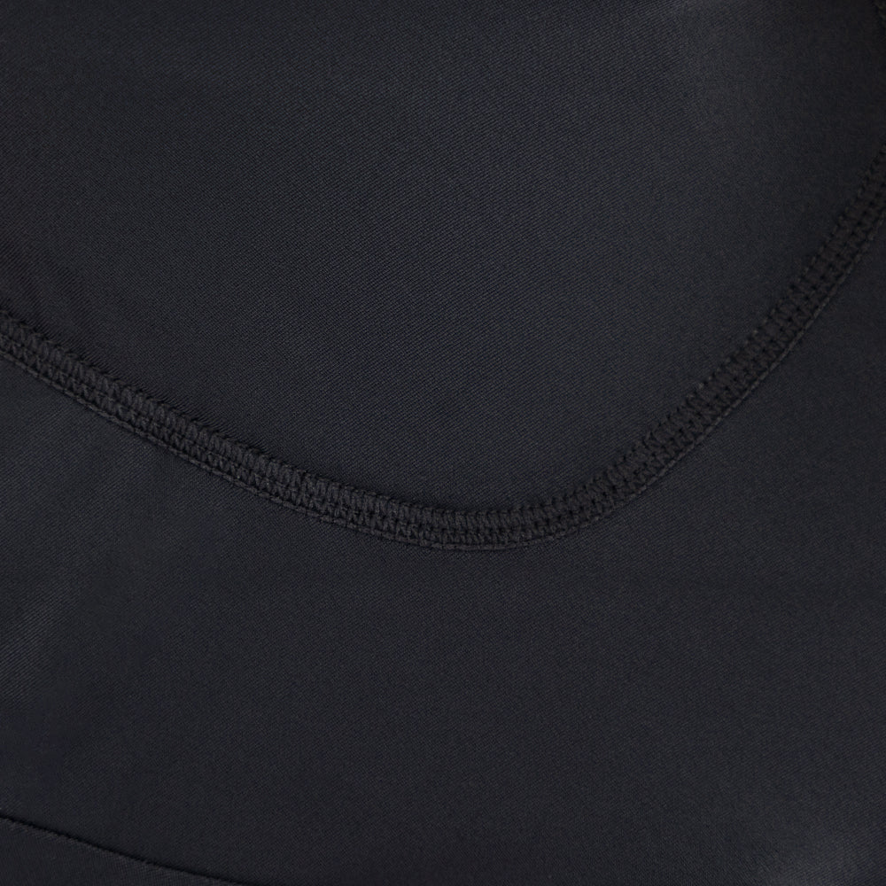 Close-up of stitching and panel construction on men’s VANGUARD tri-suit lower half in black