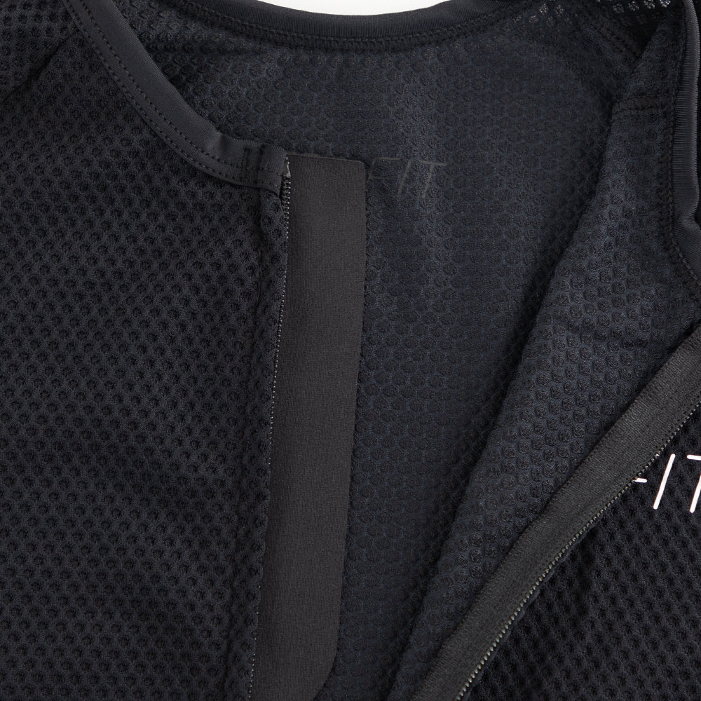 Close-up of internal neckline construction on men’s VANGUARD tri-suit in black, showing breathable mesh and clean finish