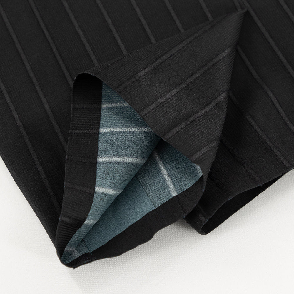 Interior hem close-up of TRI-FIT VORTEX Calf Sleeves showing bonded finish and compressive structure.