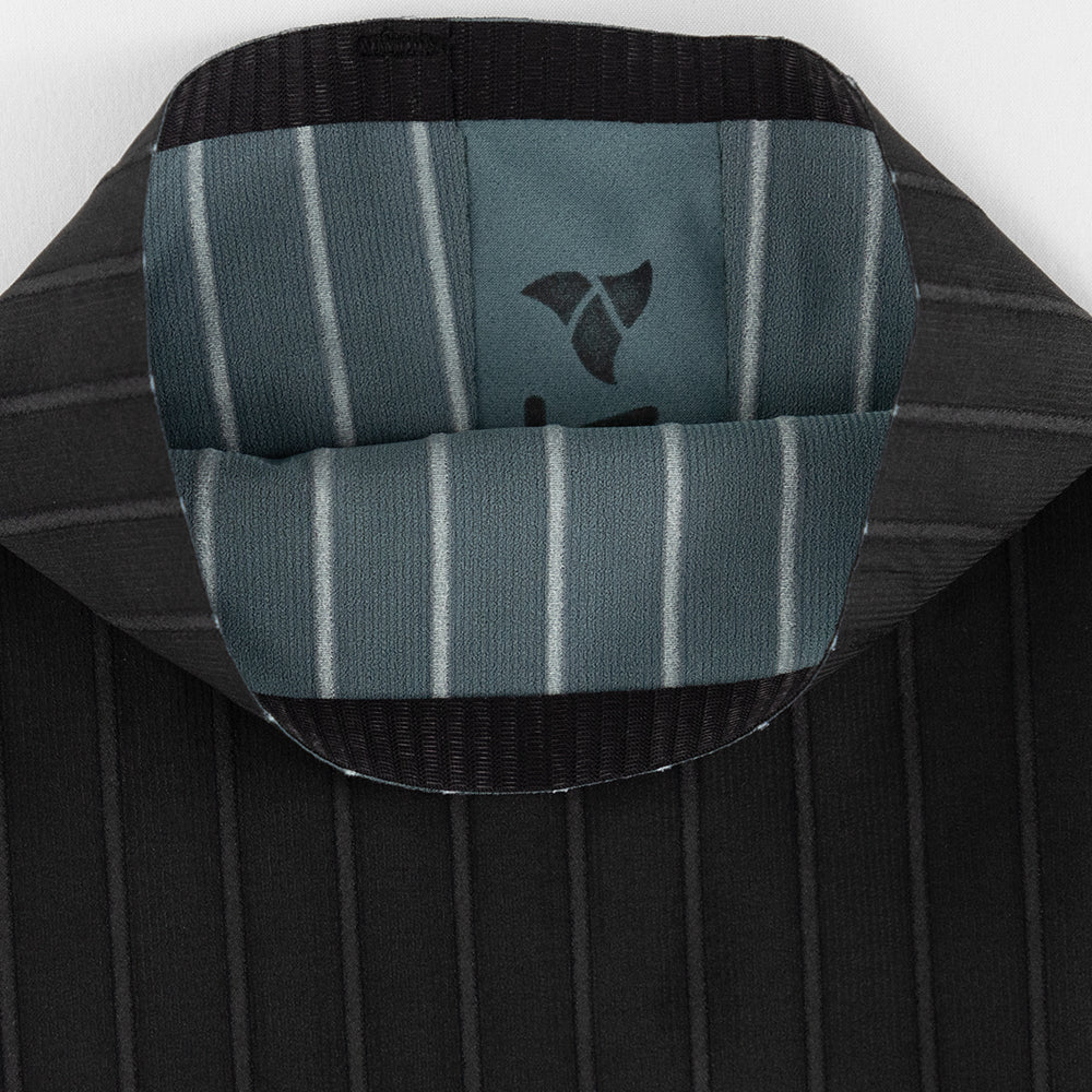 Interior hem close-up of TRI-FIT VORTEX Calf Sleeves BLACK EDTION showing bonded finish and compressive structure.