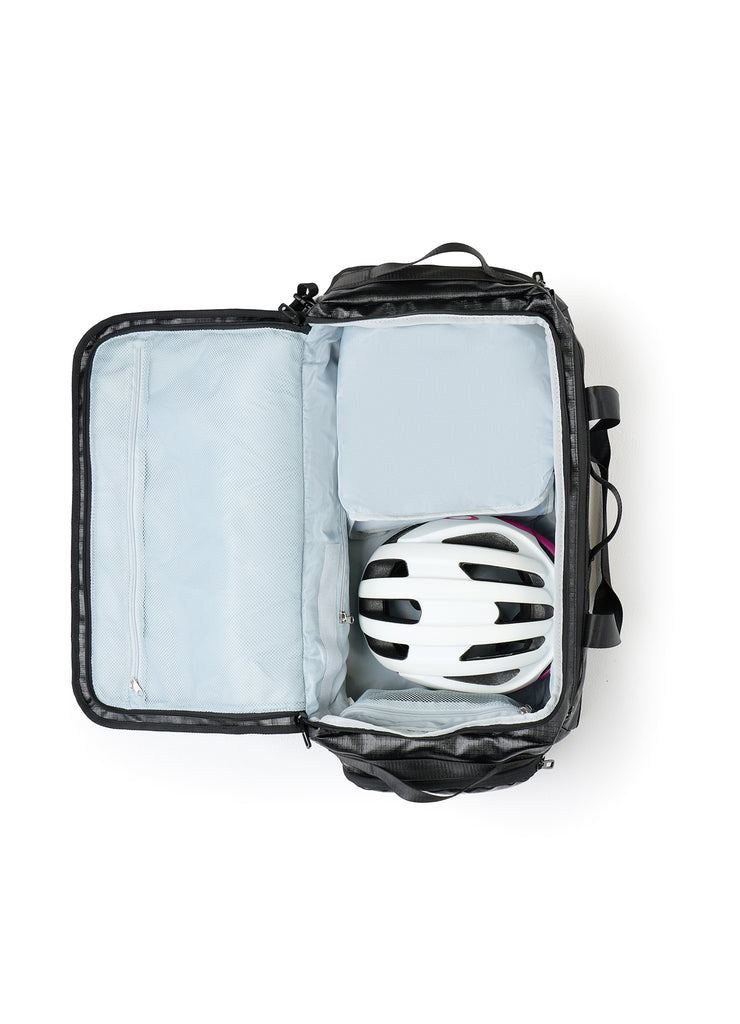 Helmet stored inside the TRI-FIT 3T Bag with divider partially filled