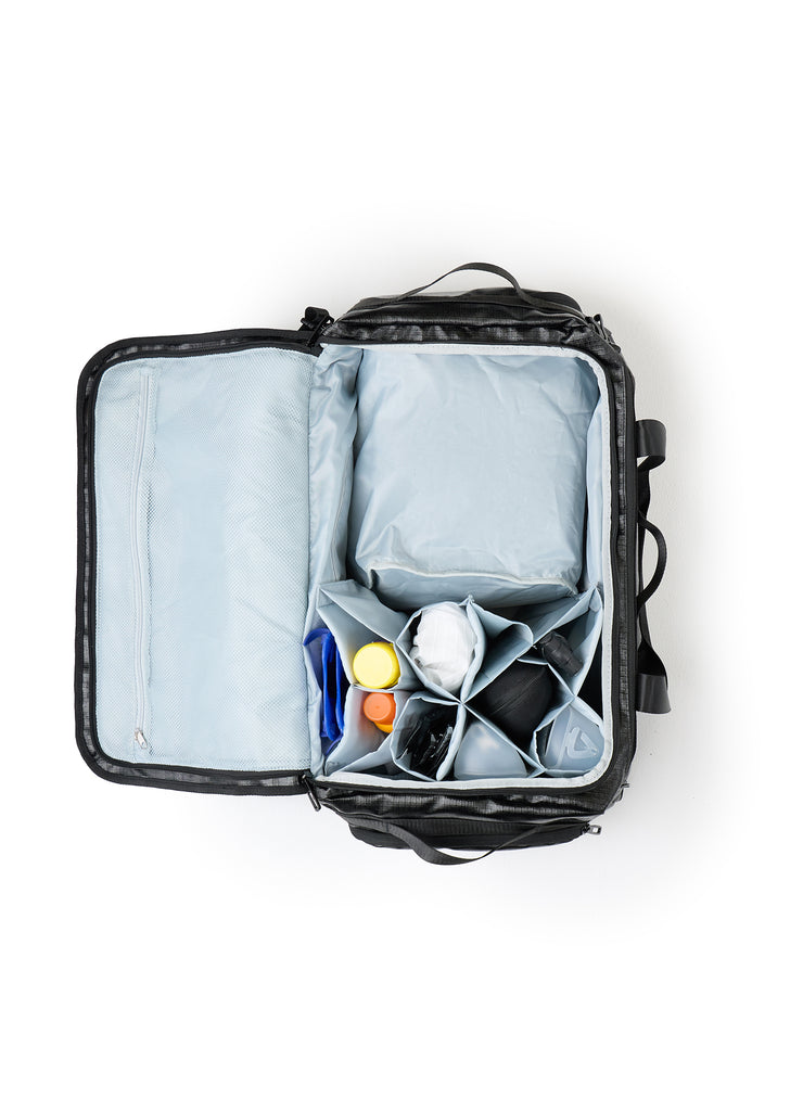 TRI-FIT 3T Bag fully packed with triathlon gear using removable divider