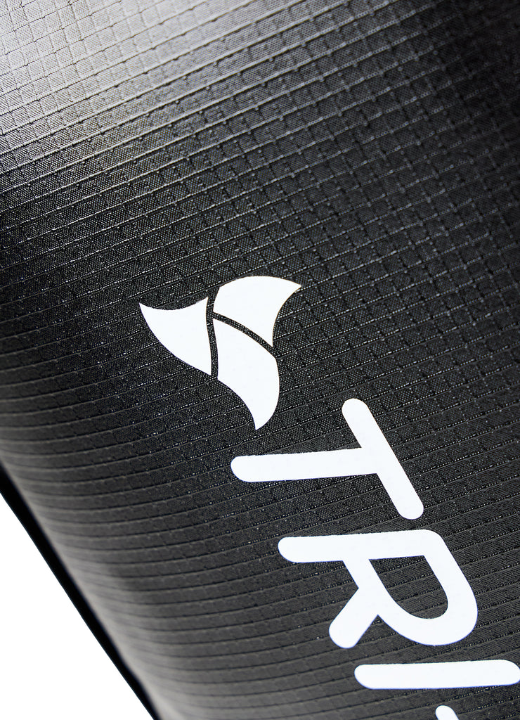 Macro shot of TRI-FIT logo print on durable ripstop fabric