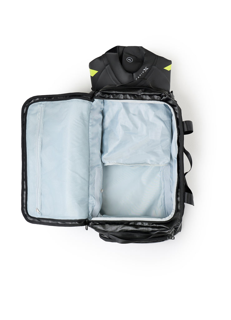 Wetsuit packed in the large waterproof section of the TRI-FIT 3T Bag